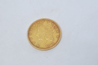 null Une pièce en or de 20 dollars "Liberty Head - Double Eagle". (1873S)

TB à TTB....