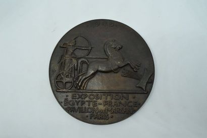 null Égypte

Médaille en bronze à double face commémorant l'Exposition Égypte-France...