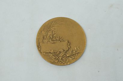 null Petite médaille en bronze doré commémorant l'Industrie et le Commerce.

Av /...