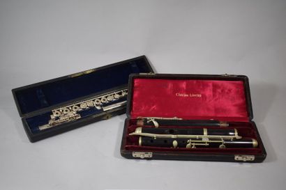 null Ensemble de deux flutes : 

Flute traversière allemande en bois, Markneukirchen,...