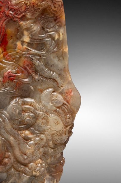 null CHINE - XIXe siècle

Important cachet en stéatite beige et rouge à décor sculpté...