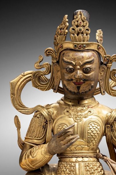 null Tibet, XVIIIe siècle.

Sujet en bronze doré et cuivre repoussé, avec rehauts...