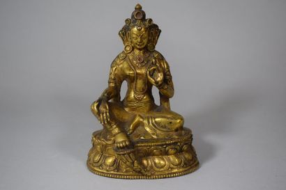 null Tibet, XVIIIe-XIXe siècle.

Sujet en bronze doré représentant la Tara verte,...