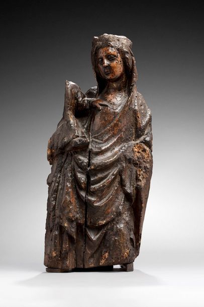 null Vierge à l'Enfant en bois sculpté, dos ébauché.

XIVe siècle

H. : 51 cm

(vermoulures,...