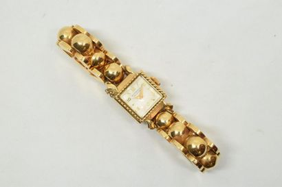 null Juvenia

Montre bracelet de dame mécanique en or jaune 18K (750) à boitier carré,...