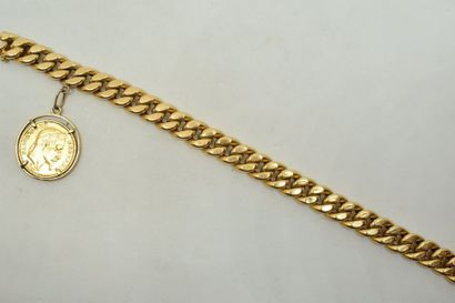null Bracelet souple en or jaune 18K (750) à maille gourmette retenant un Napoléon...