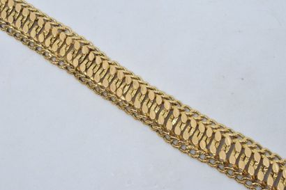 null Bracelet en or jaune 18k (750), mailles articulées au décor de grains de café....