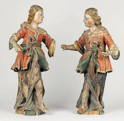 null Paire d'anges en bois sculpté et doré. Milieu du XVIIIe siècle. Ils sont représentés...
