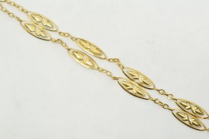 null Bracelet ajouré en or jaune 18k (750) formé de deux rangs à mailles navettes....