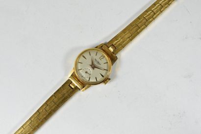 null Montre bracelet de femme en plaqué or, index bâtons, compteur à 6h.

Diamètre...