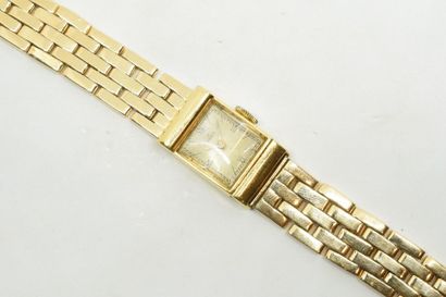 null Omega

Montre bracelet de dame mécanique en or jaune 18K (750) à boitier carré,...