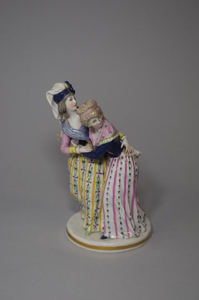 null Rauenstein XIXe- XXe 

Petit groupe en porcelaine sur socle à décor polychrome...