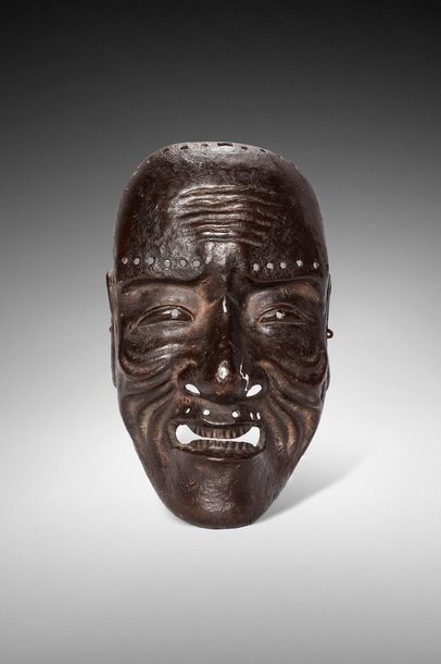 null JAPON - XIXe siècle

Masque de vieil homme en fer, les yeux plissés, la bouche...