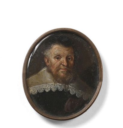 null Portrait d'un homme de face.

Miniature sur cuivre.

Il porte un habit noir...