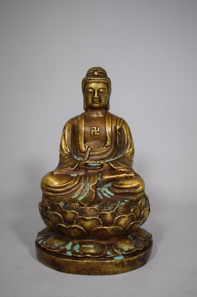 null Statuette de bouddha en bronze doré assis en padmasana les mains en dhyana mudra,...