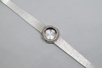 null Débris. Epave de montre bracelet, boîtier et bracelet en or gris 18k (750).

Poids...