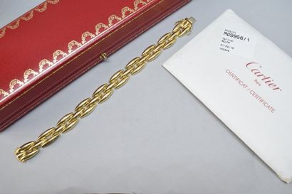 null CARTIER
Bracelet souple en or jaune 18k (750), maillon fuseau, modèle Gentiane...