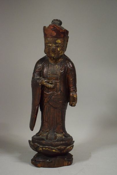 null VIETNAM - XIXe siècle

Statuette de moine bouddhiste en bois laqué or, debout...