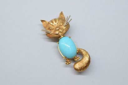 null Broche chat en or jaune 18K (750) le corps orné d'un cabochon à l'imitation...