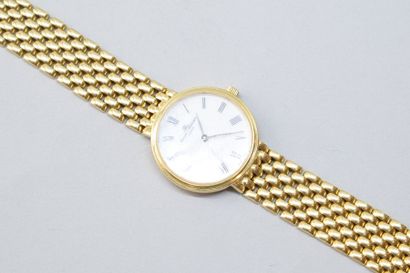 null Monte bracelet de dame à quartz en or jaune 18K (750) à boîtier rond, le cadran...