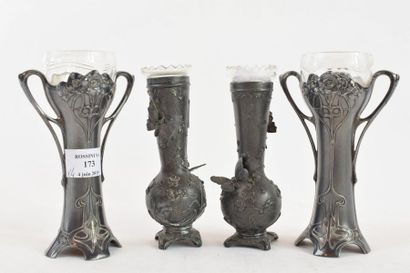 null WMF

Ensemble en métal argenté et verre composé de deux paires de petits vases,...