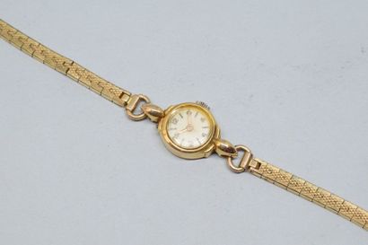 null Montre bracelet de dame, boîtier rond en or jaune 18k (750), cadran à fond crème,...