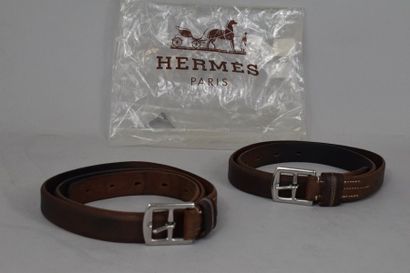 null Ensemble de deux ceintures en cuir marron réalisées à partir d'étrivières Hermès....