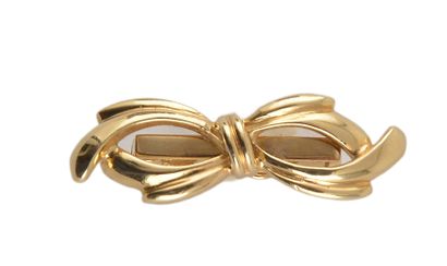 null OR 14K
Broche en or 14K stylisant un ruban. 
Poids: 3.72g