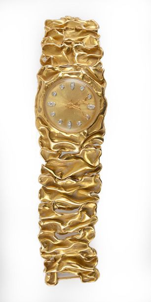 null DELRUE, Georges (1920-2010)
Montre en or 18K, cadran serti de diamants.
Signée...