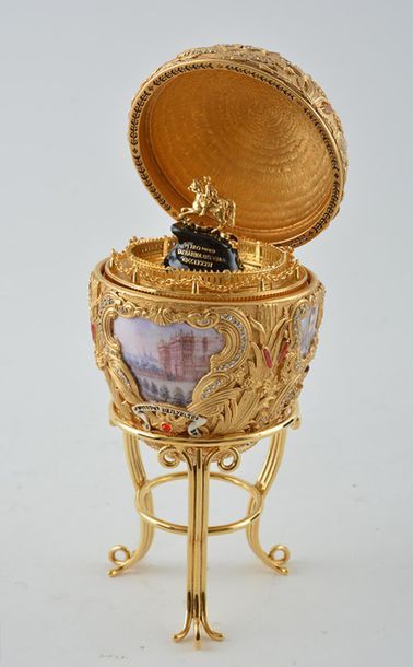 null After FABERGÉ
Fabergé reproduction porcelain egg of the "Peter the great" egg...