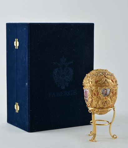 null After FABERGÉ
Fabergé reproduction porcelain egg of the "Peter the great" egg...