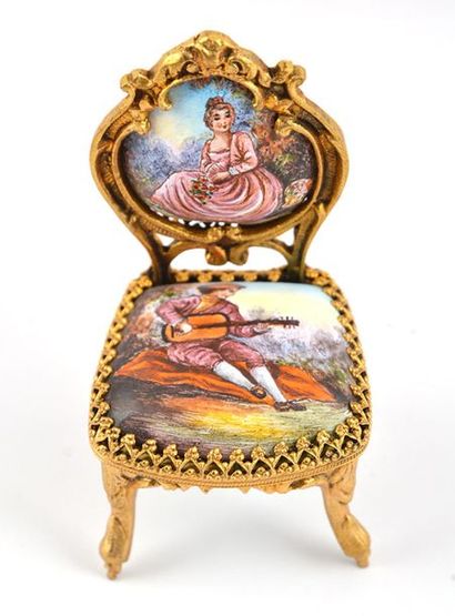 null Ensemble of cloisoné miniature objects comprised of a table, a sofa and 4 chairs...