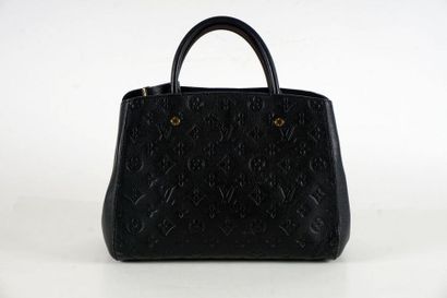 null LOUIS VUITTON BAG
Lady bag in black imprinted Monogram leather.
Interior with...