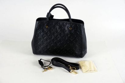 null LOUIS VUITTON BAG
Lady bag in black imprinted Monogram leather.
Interior with...