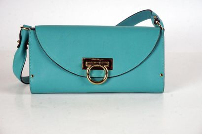 null SALAVORE FERRAGAMO BAG
Small smooth turquoise rectangular leather bag with flap...