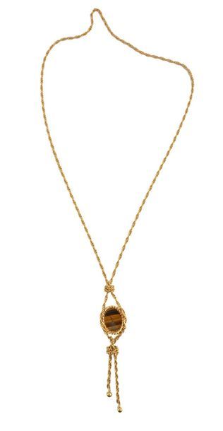 null PIAGET
18K (750) yellow gold pendant necklace
pendant with tiger eye, oval case,...