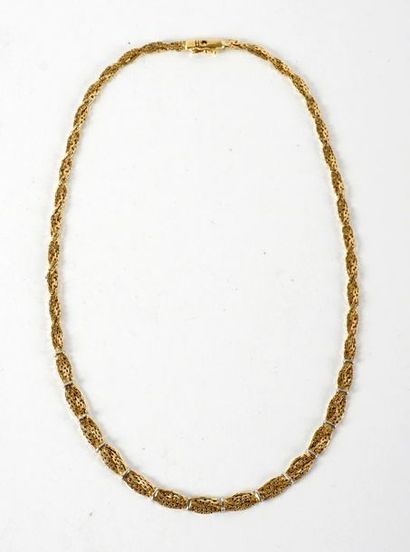 null 14K GOLD NECKLACE
Necklace in 14K yellow and white gold, braided with 2 strands.
Weight:...