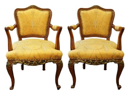 null IN THE STYLE OF LOUIS XV
Set of two richly carved Louis XV style armchairs with...