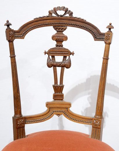 null Pair of Louis XVI style chair in molded and carved wood with openwork cassolette-shaped...