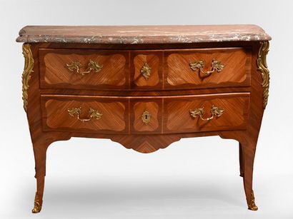 null Louis XV style chest of drawers in rosewood veneer and marquetry, curved front...