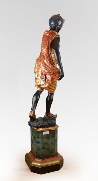null Venetian style torchiere in lacquered and gilded wood, decorated with a Blackamoor...