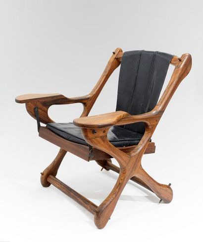 null SHOEMAKER, Don S. (1920-1990) - SENAL
Rosewood, leather rocking lounge chair,...