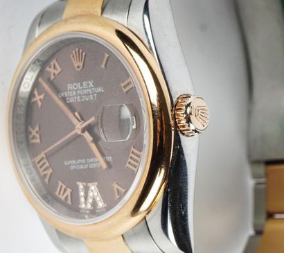 null ROLEX DATEJUST
Montre Rolex Datejust à mouvement automatique
Cadran brun avec...