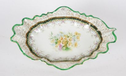 null PORCELAIN, GERMANY
Oval porcelain dish with flower decoration marked in the...