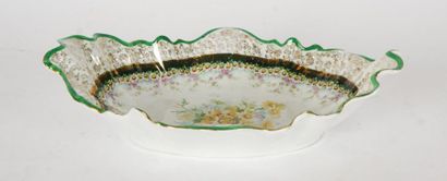 null PORCELAINE, ALLEMAGNE
Plat ovale en porcelaine à décor flora marqué au cul ''...