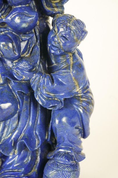 null SCULPTURE
Sculpture in blue stone representing a laughing old man and a child
H:...