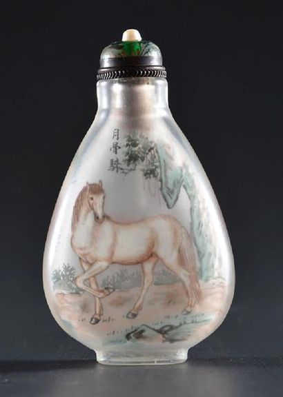 null CHINA
Glass snuff bottle painted inside with a decor of a horse in nature and...