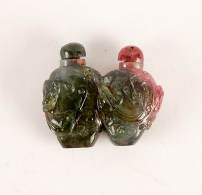 null CHINA, TOURMALINE
Double tourmaline snuff bottle, carved in relief of a dragon...