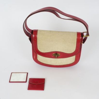 null HERMÈS

Red leather and beige fabric handbag with double straps, purse and mirror...