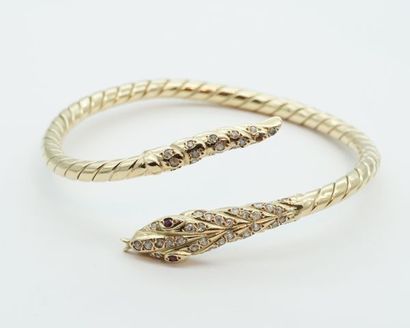 null Bracelet jonc « Serpent » en or jaune 18K torsadé, la tête et la queue serties...
